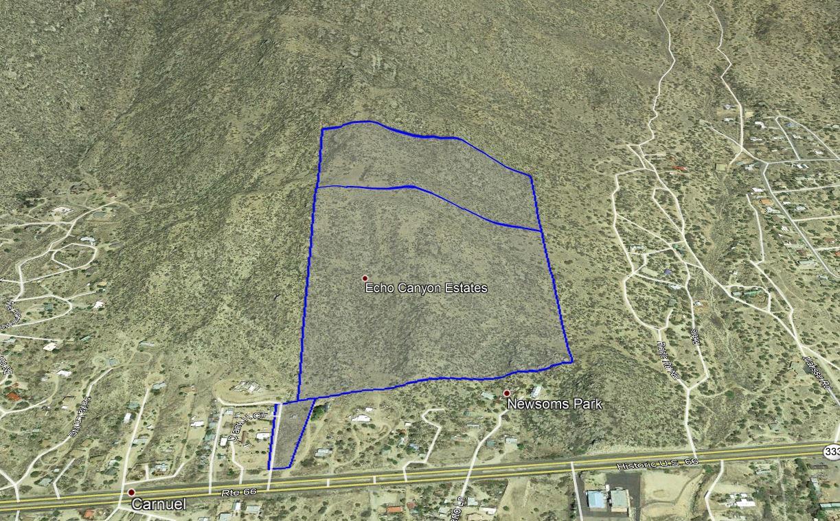 A rare opportunity near Albuquerque... own 61 Acres of the Sandia's and backing to the National Forest on two sides. A private paradise with amazing rock formations, meadows, and views like nothing else. This property consists of three parcels with access off RT-66 in Carnuel, 3 Minutes from Tramway and I-40.