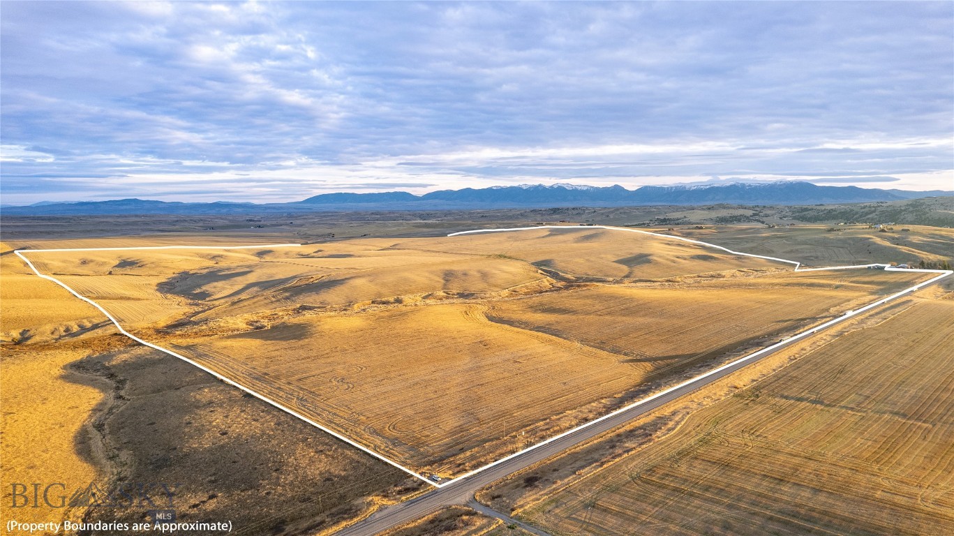 Large Acreage Development Opportunity. Located just west of Four Corners are these 3 contiguous parcels totaling just over 600 acres with NO ZONING RESTRICTIONS or Covenants. Property is located within 15+- minutes of Downtown Bozeman and 15+- minutes to the Airport. Also Minutes from Madison River Public Access. Unobstructed Mountain Views, easy access, and ample ground water are some of the Highlights. This property can be taken any direction including but not limited to development, agricultural, residential, or investment. Buyer to verify all information.