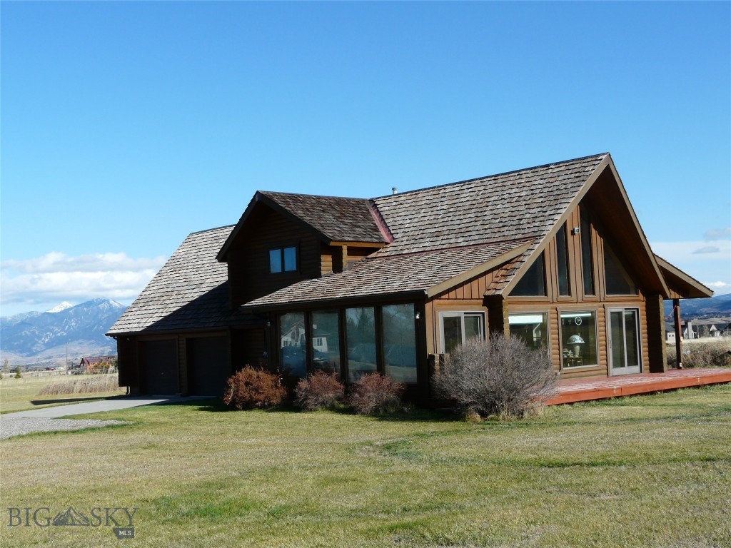 This "first time ever on the market" property includes a cozy log cabin on 5 acres in an incredible, highly sought after location near the entrance to the Hyalite Recreation Area and the Custer Gallatin National Forest. There are large custom homes in the area and views of mountains all around. The 5 acres offers plenty of room to build a new home on the site while living in the current one. The property lies in the Bozeman Elementary School district and the Hyalite zoning district. It is distant from major roads but still a short drive into Bozeman. There are no known covenants affecting the property.  There is a small kitchen, laundry area, one bedroom and bath, a great room, and a sunroom on the main level. The upper-level features two additional bedrooms, one bath, a small loft area, and a balcony off one of the bedrooms. An added feature is one of the few windmills left in Gallatin County that potentially could be used for irrigation is located on the property. Additional information can be found for this property by clicking on "View Documents".