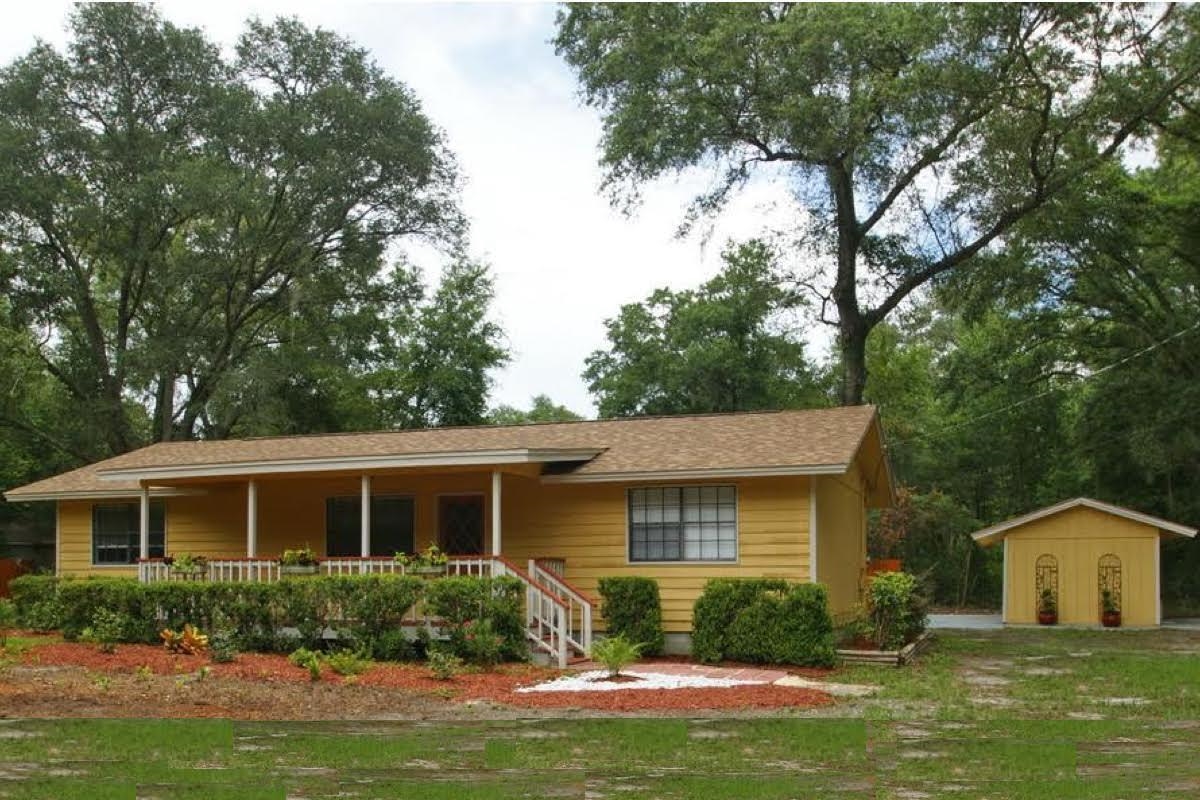 Great Country house with a mother-in-law-suite.Great location. Close to Tallahassee and easy access towards the coast. A must see! The house has 1200 sqft of 3 bedrooms & 2 Bath; and a large mother in law suite (288 sqft) with an updated full bath. Roof of 2020, Newer HVAC and new drain field.  In 2022: New Stainless kitchen appliances, granite kitchen countertop, kitchen island, new ceiling fans, new light fixtures, upgraded bathrooms, fresh paint and new flooring. Large living room, Big walk-in closet in master bedroom, Utility Room and Termite Bond. Open floor plan.Huge front yard and cleared fenced backyard. Relax on the two big covered porch & patio and you'll never want to leave.  All one needs to enjoy that country lifestyle.