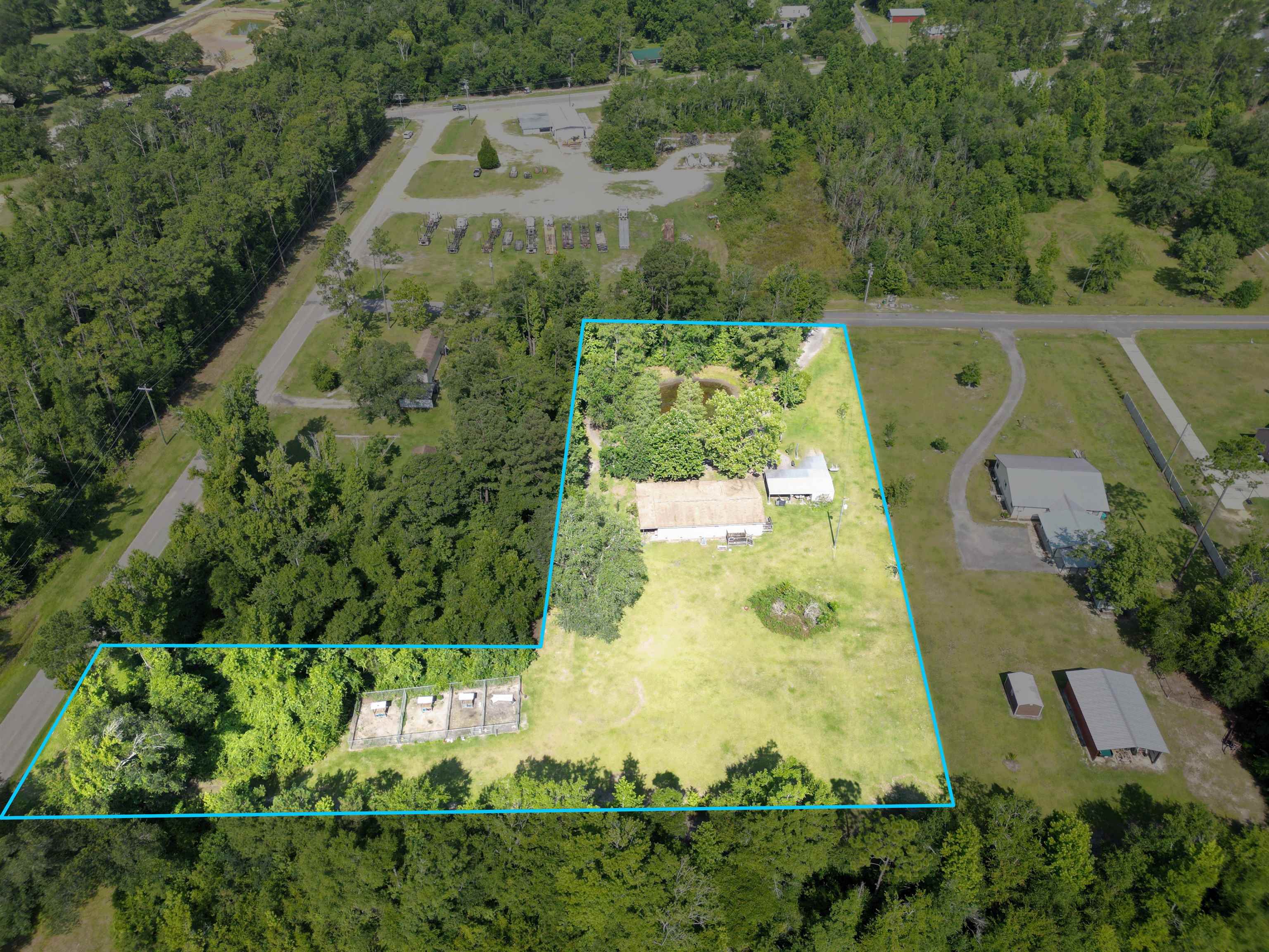 **** BACK ON MARKET - NO FAULT OF SELLER! PRICE REDUCED FOR QUICK SALE!   Very cozy 4 bedroom/2 bathroom single family home located in rural Liberty County, Florida, specifically Bristol.  2.2 acres available to romp and roam as you please with no restrictions.  You can sit on your large front porch eating fruit from your very own fruit trees scattered throughout the property or just drinking your coffee admiring the view of your very own pond in the front yard! And don't worry, there's doctors, pharmacy, grocery stores, and schools conveniently located just "up the road".  House has been updated with reinforced floor joist, updated counter tops, floors and more.  Come park your car under the detached carport and sit awhile, let's make this your next forever home!