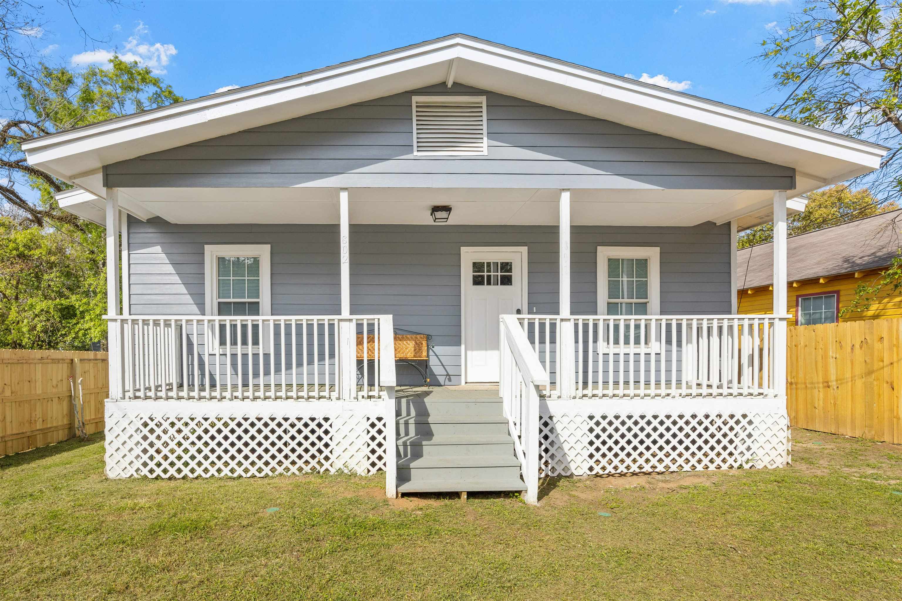 Recently renovated in 2022, this 2 bedroom, 2 bath cottage sits on a corner lot with a new (2023) 6 foot privacy fence! The 2023 washer and dryer come with the home too. If you are looking for a move in ready home with cottage style charm, this is the one!