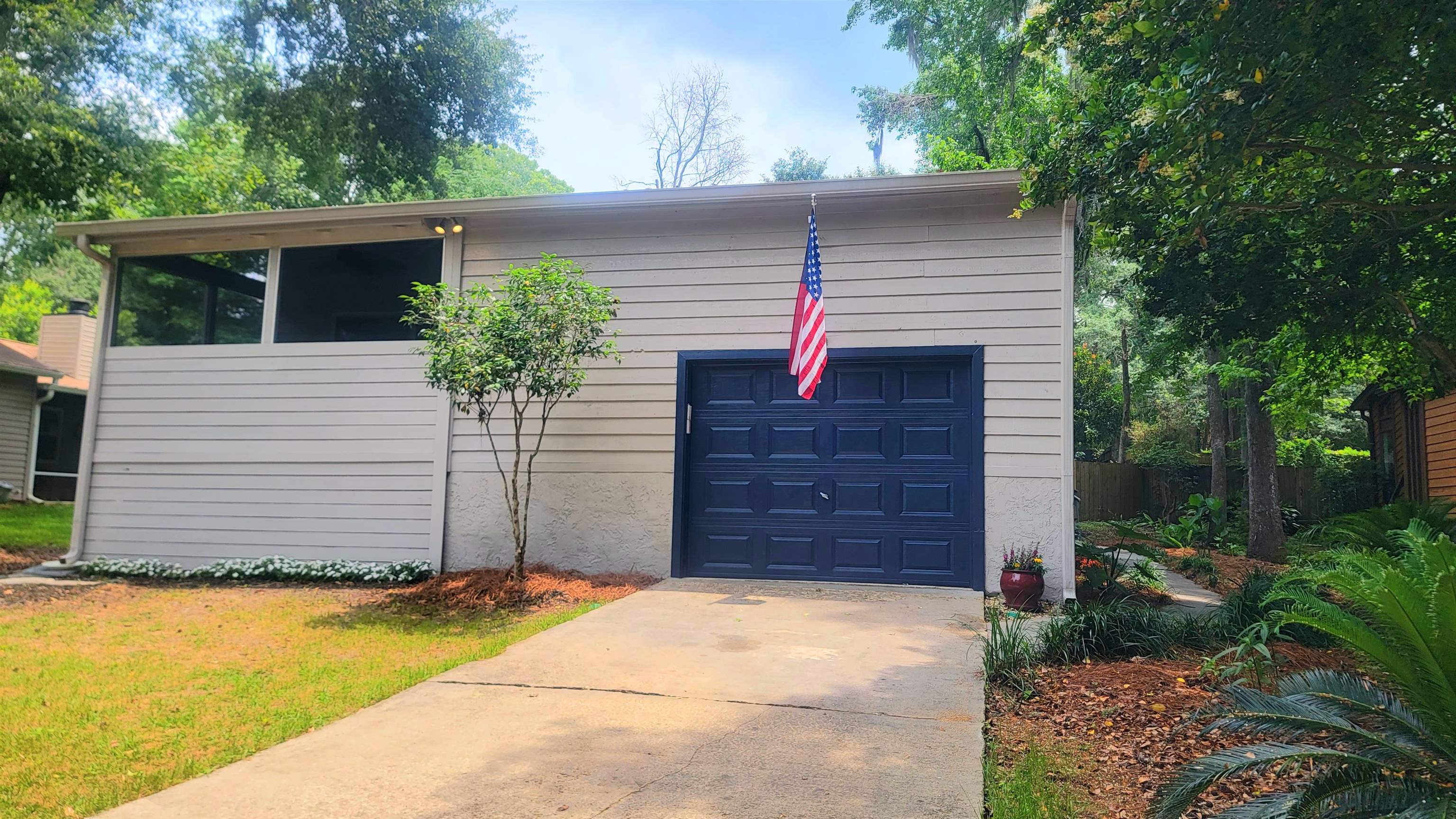 Beautifully updated home in the desirable neighborhood of Killearn Estates. Top rated school district: Desoto, Montford, Chiles. City sewer. New roof, flooring, kitchen, windows, doors, New Screened in porch & much more. Primary Bedroom features private screened-in porch, walk-in, closet, garden tub,  & double vanities. The extra large kitchen features an island with glass cook-top, double ovens, and separate coffee bar. The main living area is open to sitting area by the fireplace & the dining room. The pristine maintained yard features a new deck, firepit area, & beautiful large oak. Back gate opens to Shamrock for easy access.