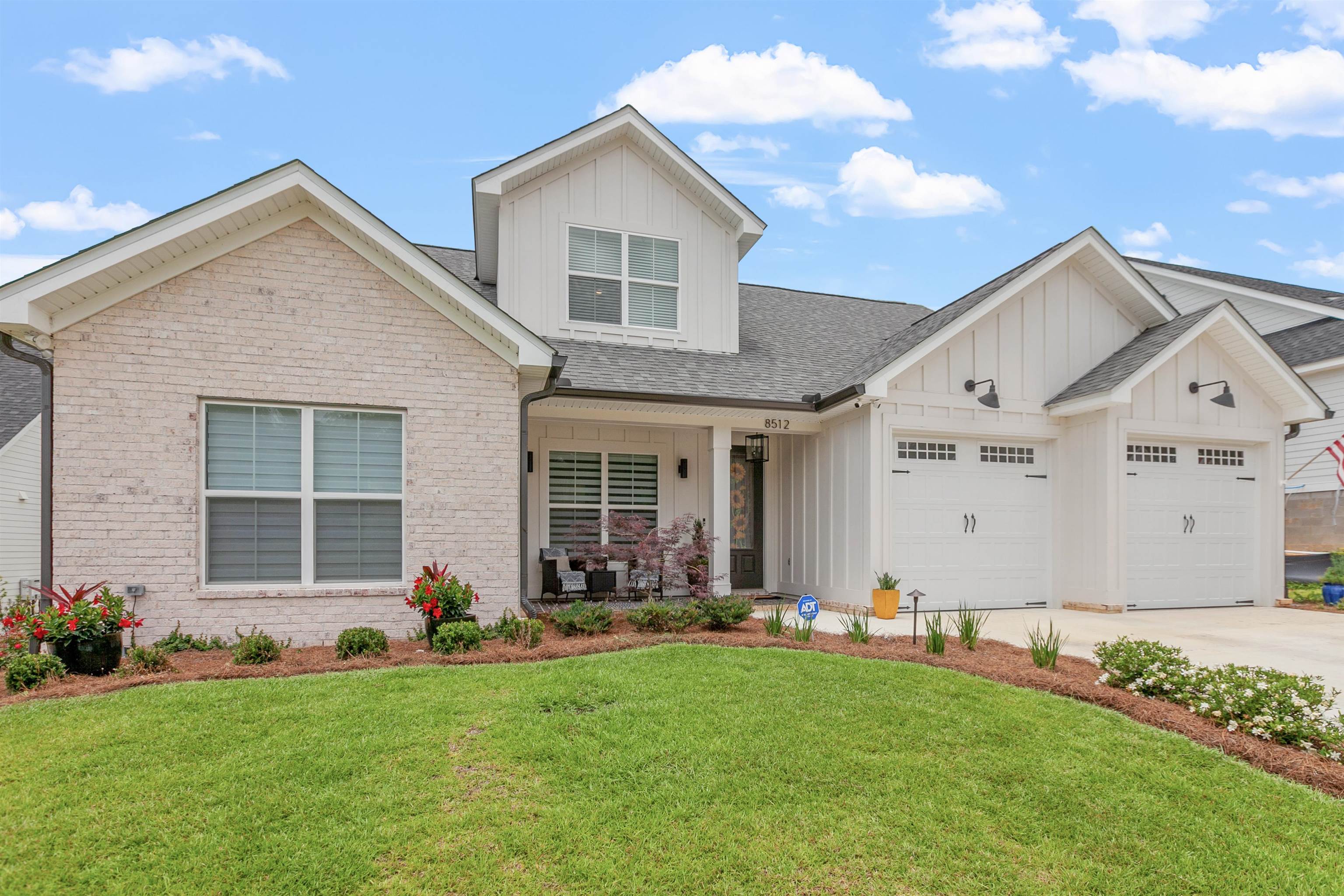 Are you searching for new construction in NE Tallahassee that you can actually close on this month? Do you want high quality amenities with luxury upgrades that are not found in standard new construction? Your search is over! This 4 bedroom, 3 bath house in The Hammock at Oak Grove was completed in September 2022. It was meticulously styled with a mixture of luxury and modern design from the Carrara marble with waterfall feature on the kitchen island, to sleek contemporary GE Cafe appliances, to light fixtures that are statement pieces, to remote control blinds, plus an open floorplan that encourages entertaining whether indoors or on the covered porch overlooking the backyard with green space frontage. This split bedroom design offers two bedrooms/2 bathrooms and an office downstairs, PLUS two more bedrooms, one bathroom, a loft, and walk in attic storage room upstairs. Don't miss your chance to make this house your home this summer!