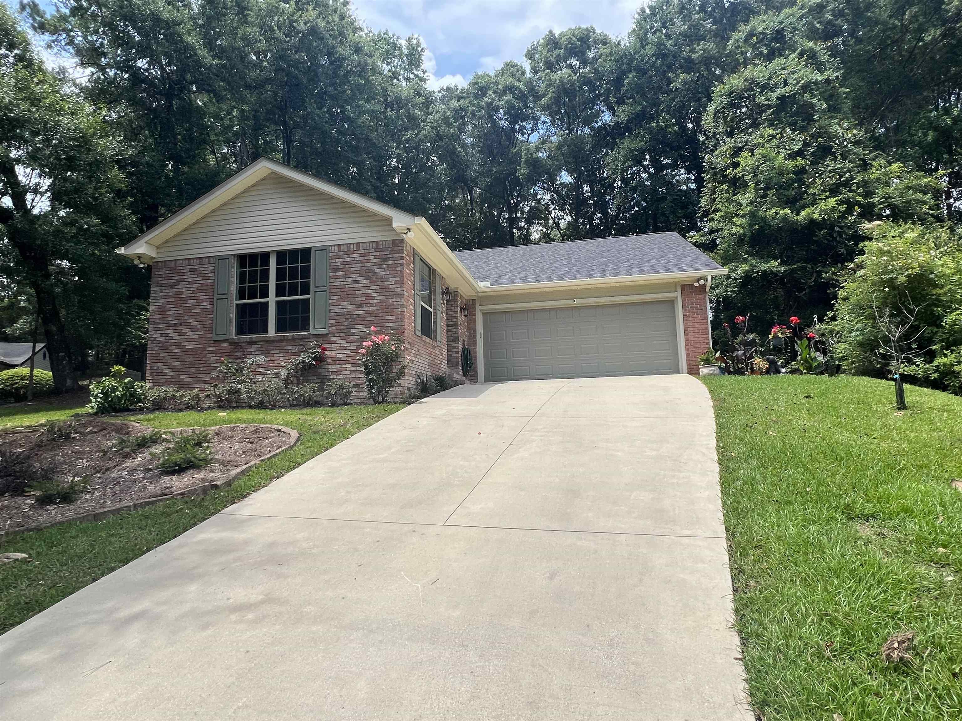 Professional pictures scheduled Tuesday.  A wonderful home with over 2,000 sq ft of non-carpeted living space.  An addition was added in 2017 by Roberts Construction adding space as a living room, office or game room.  9 ft ceilings, great light throughout.  New sliding glass doors installed to patio with a pergola.  A small private backyard perfect for that morning coffee or afternoon respite, which you will have time for because no mowing needed in the back.    Efficient kitchen with double ovens.  The main bedroom has 3 closets!  One walk in and 2 extra large closets.  Who doesn't need 3 closets!?  Bathroom has  a large shower, so no need to do that upgrade that's needed in so many homes.  Home sits high and has great curb appeal.  The driveway is in great shape and has an extra parking pad.  Convenient location near Midtown, restaurants, shopping.  Near everything but on a cul-de-sac on a quiet street.  Best of worlds.