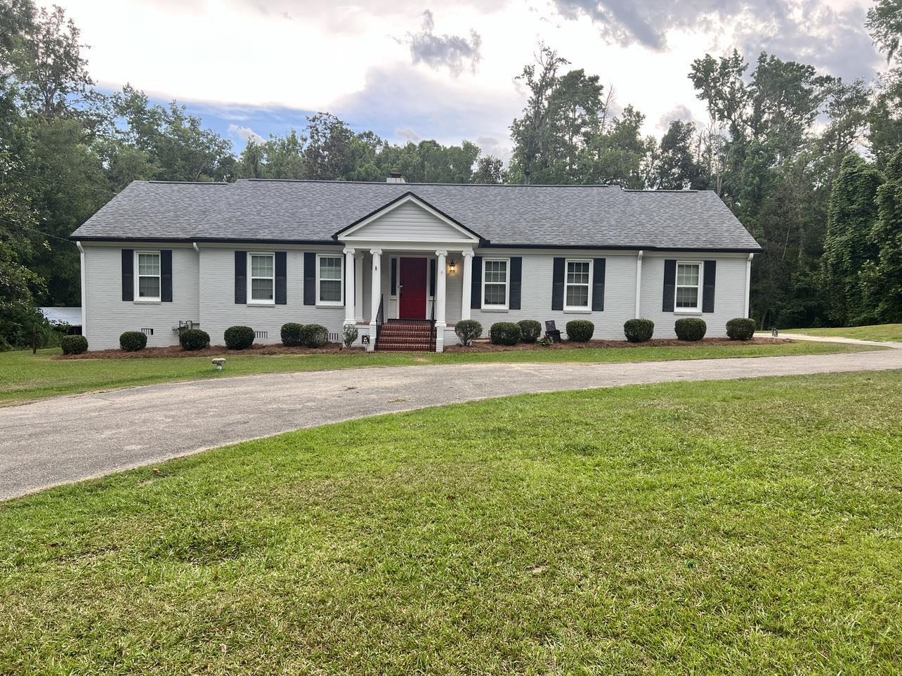 MUST SEE beautiful home & almost 8 acres of land in the historic district of Quincy, Florida.  This very well built and maintained home offers plenty of room at over 4000 total sq feet, 2369 heated and cooled.  This is a 3 parcel sale that not only has a "main house" but a cabin located on the property for a guest suite or potential rental income.  Hardwood floors, 2 fireplaces, 2 car garage, pool with large back deck, gated entry, in house laundry room with washer and dryer... the list goes on and on... if you are looking for a large, rural home convenient to downtown historical Quincy, Florida, this is the one!
