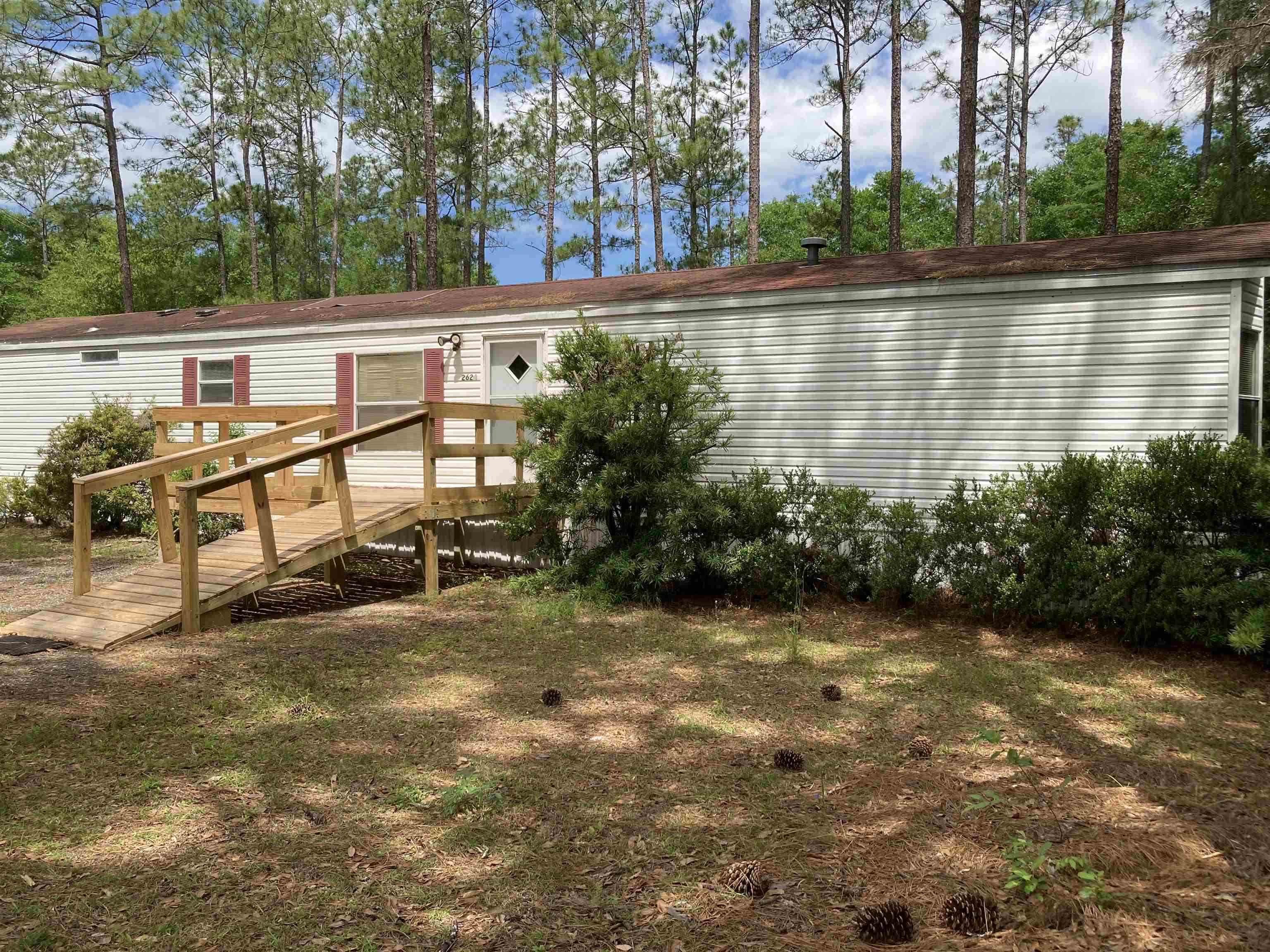 Nice house with a beautiful large yard. 2023 upgrades. No lot fees. New roof 2023. Central AC blows cold, stove and refrigerator clean and functional. Unit includes a storage shed. new wood deck at front with a handicap ramp. Owner is a REALTOR. PROOF OF FUNDS REQUIRED WITH OFFER.
