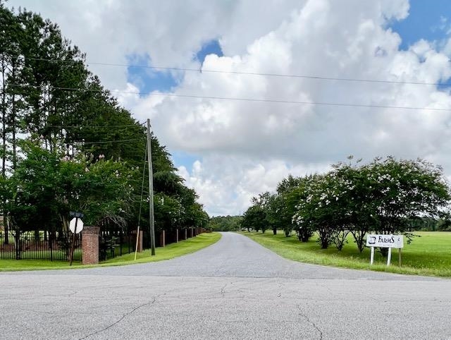 Prime front  acreage on Solomon Dairy Rd., adjacent to the beautiful " Golf Club of Quincy".... This property is zoned Agricultural-Residential 1 to 1......planted in pines...this property can be developed, hunted, or private residential home.