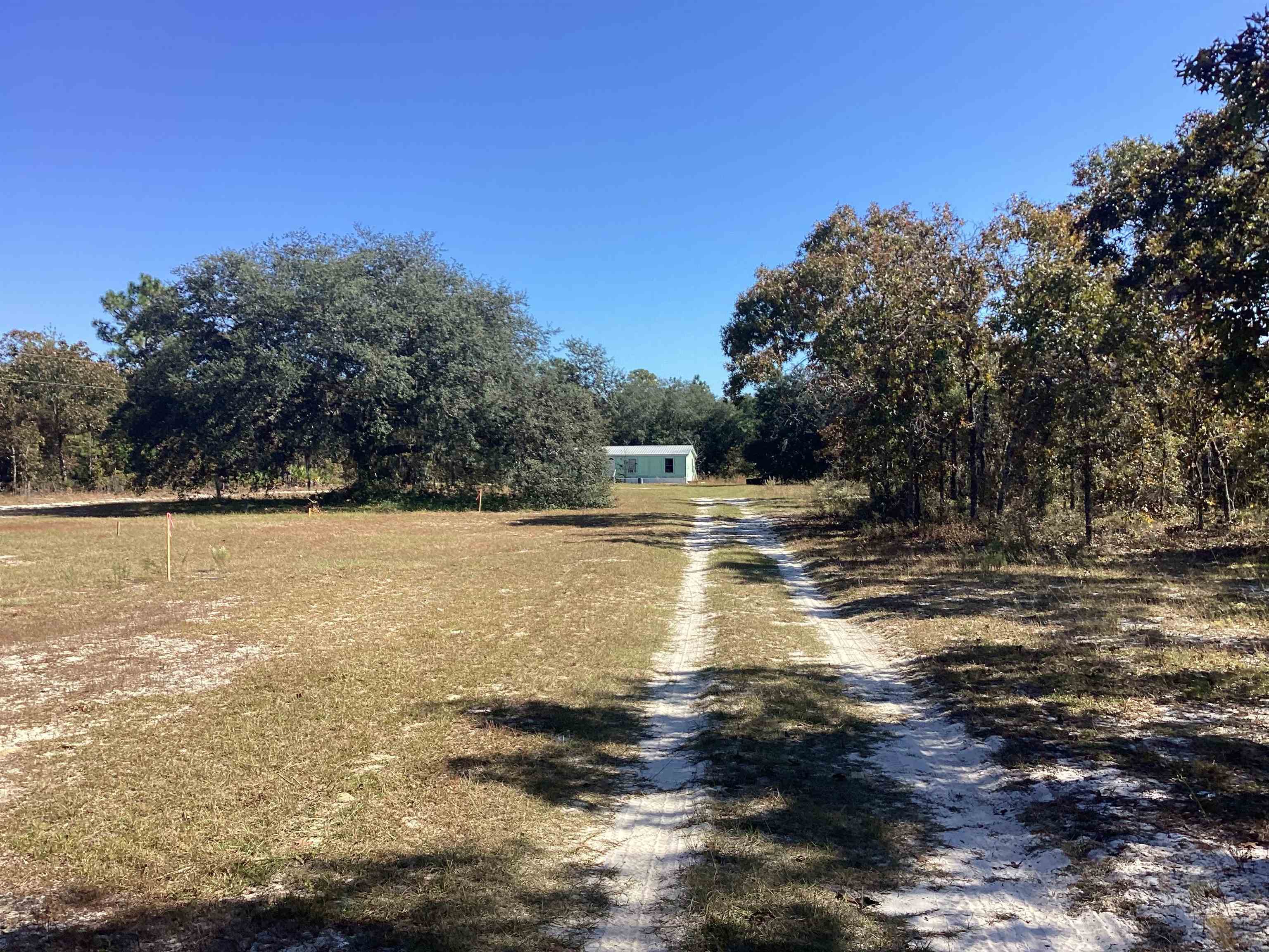 Calling all investors!!!! Checkout this older 4 bedroom 2 bath mobile home on 3.26 acres in the Lake Talquin community of Quincy Fl. This home sits on a 1.70 acres parcel, the adjacent parcel is 1.56 acres where another mobile can be added. Home will need work, but has the potential for good income. There is an abundant of wildlife on the property. Home is on Talquin water.